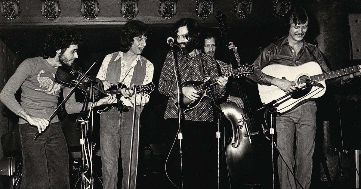 The David Grisman Quintet performing on stage together in 1979