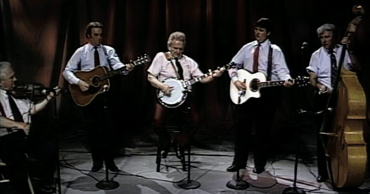 Ralph Stanley and the Clinch Mountain Boys performing on stage in 1993