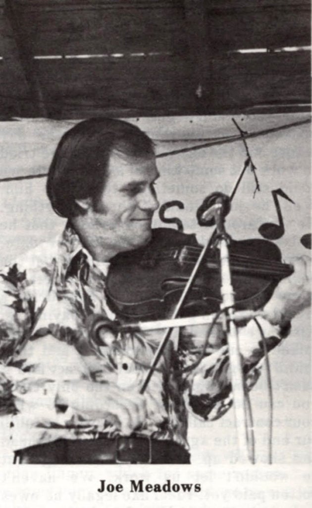 Black and white image of Joe Meadows playing the fiddle.