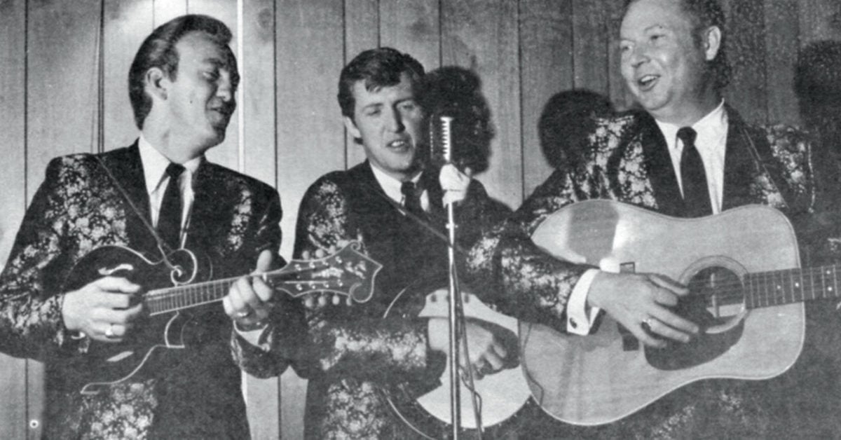 The Kentucky Mountain Boys performing together on stage.