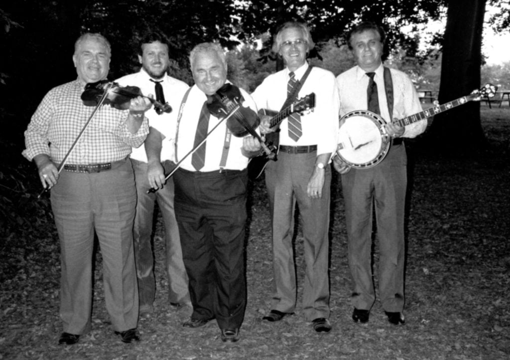 Lonesome Pine Fiddlers 2nd Reunion July 1989  L to R: Charlie Cline, Bill Hamm, Curly Ray Cline, Melvin Goins, Ray Goins   Photo by  Ronald L. Stuckey