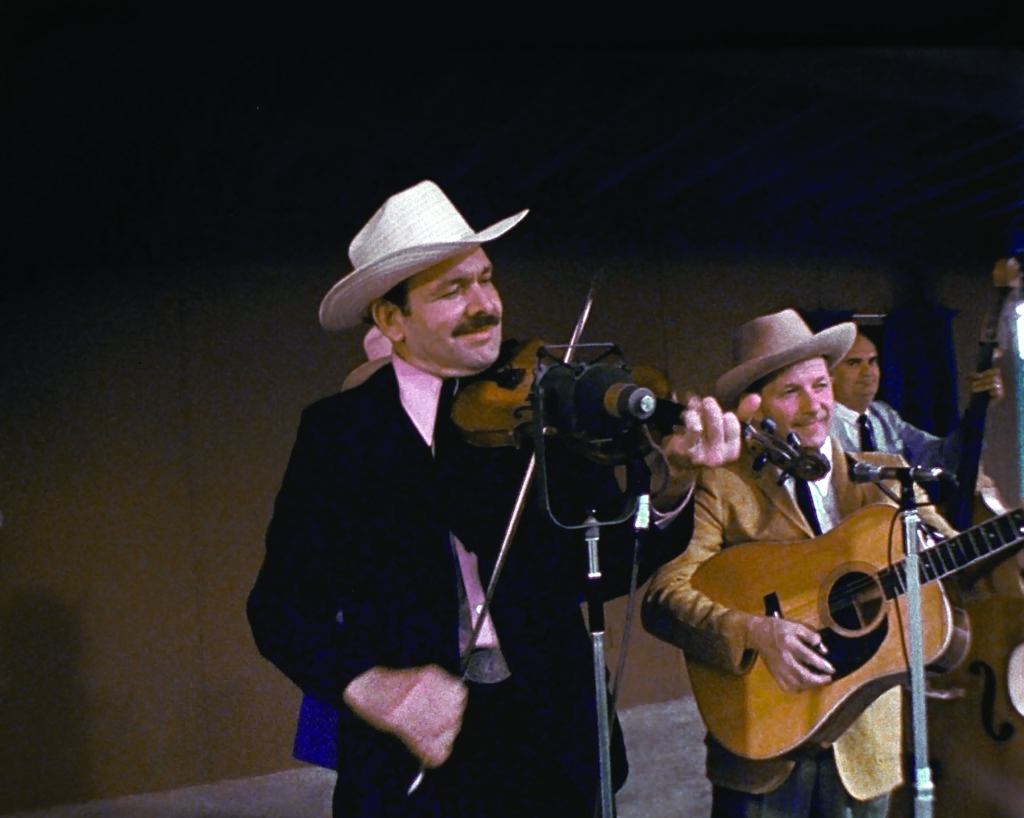 Tex Logan with The Lilly Brothers and Don Stover.Photo by Bob Kaylor