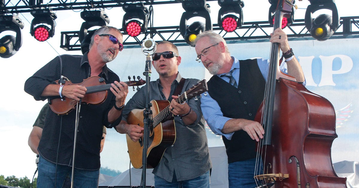 Balsam Range’s Buddy Melton, Caleb Smith, and Tim Surrett performing at ROMP 2021. Photo by Dan Miller